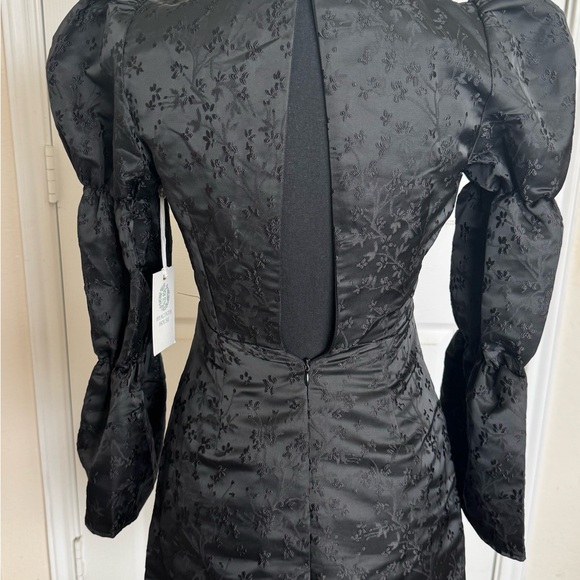 black jacquard puff sleeve darcy mini dress Darcy Black Mini Dress with Chic Style – Product Video main image 1